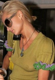 Paris Hilton shops topless